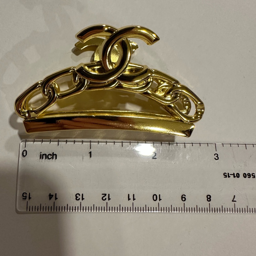 CHANEL Gold Logo Hair Accessory